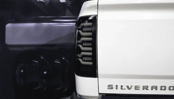 AlphaRex 14-18 Chevrolet Silverado 1500 / 15-19 Silverado 2500HD/3500HD / 15-19 GMC Sierra 3500HD Dually LUXX-Series LED Tail Lights Black