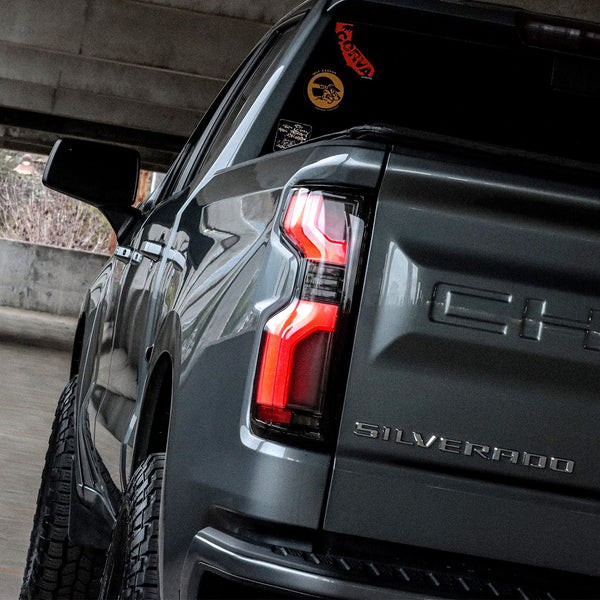 AlphaRex 19-25 Chevrolet Silverado 1500 / 20-25 Silverado 2500HD/3500HD LUXX-Series LED Tail Lights Alpha-Black