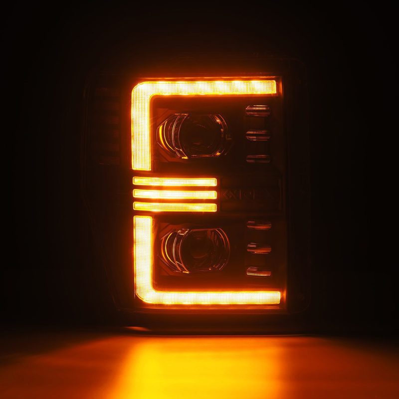 AlphaRex 08-10 Ford Super Duty/Excursion PRO-Series Halogen Projector Headlights Black