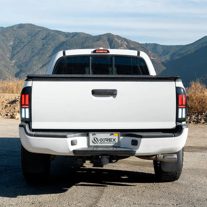 AlphaRex 05-15 Toyota Tacoma NOVA-Series Prismatic LED Tail Lights Alpha-Black