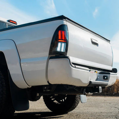 AlphaRex 05-15 Toyota Tacoma NOVA-Series Prismatic LED Tail Lights Alpha-Black
