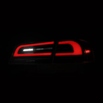 AlphaRex 12-21 Tesla Model S LUXX-Series LED Tail Lights Alpha-Black (With Black Trunk Center Piece Replacement)