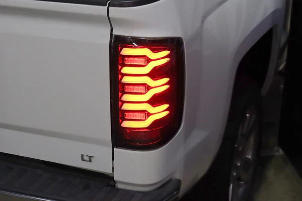 AlphaRex 14-18 Chevrolet Silverado 1500 / 15-19 Silverado 2500HD/3500HD / 15-19 GMC Sierra 3500HD Dually LUXX-Series LED Tail Lights Black