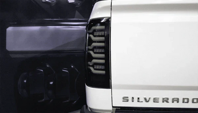 AlphaRex 14-18 Chevrolet Silverado 1500 / 15-19 Silverado 2500HD/3500HD / 15-19 GMC Sierra 3500HD Dually LUXX-Series LED Tail Lights Black