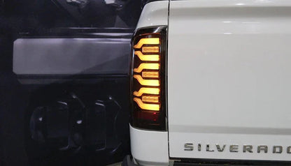 AlphaRex 14-18 Chevrolet Silverado 1500 / 15-19 Silverado 2500HD/3500HD / 15-19 GMC Sierra 3500HD Dually LUXX-Series LED Tail Lights Black