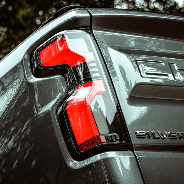 AlphaRex 19-25 Chevrolet Silverado 1500 / 20-25 Silverado 2500HD/3500HD LUXX-Series LED Tail Lights Black Red