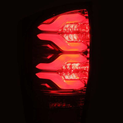 AlphaRex 16-23 Toyota Tacoma PRO-Series LED Tail Lights Red Smoke