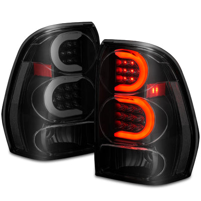 ANZO 2002-2009 Chevrolet Trailblazer LED Tail Lights w/ Light Bar Black Housing Smoke Lens 311372