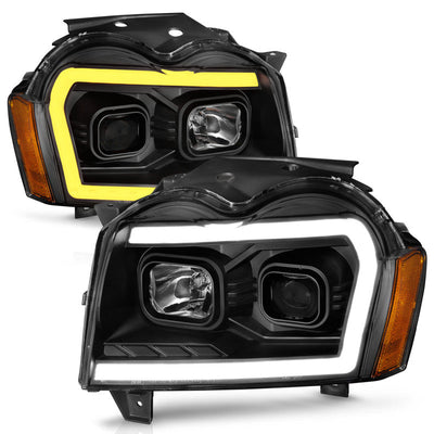 ANZO 2005-2007 Jeep Grand Cherokee Projector Headlights w/ Light Bar Switchback Black Housing 111543
