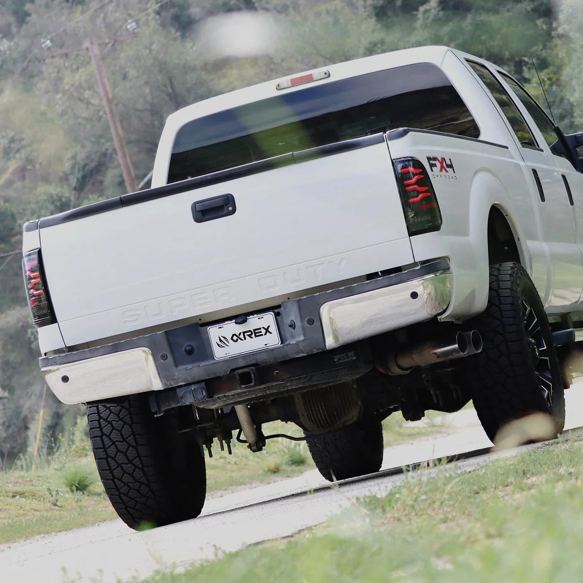 AlphaRex 99-16 Ford Super Duty / 97-03 F150 LUXX-Series LED Tail Lights Alpha-Black