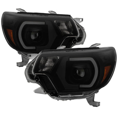 SPYDER xTune 12-15 Toyota Tacoma Light Bar DRL Projector Headlights - Black Smoke (PRO-JH-TTA12-LBDRL-BSM) 9037559