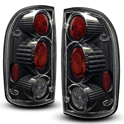 Winjet 2001-2004 Toyota Tacoma Altezza Tail Light - Black/Clear