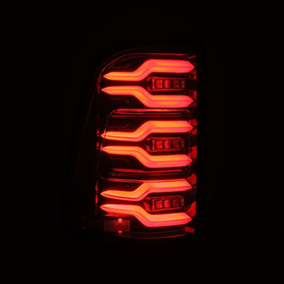 AlphaRex 19-21 Dodge Ram 1500 Luxx-Series LED Tail Lights Alpha-Black w/Activ Light/Seq Signal 640030 *Discontinued