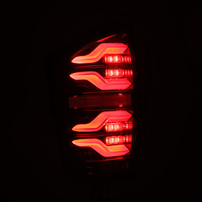 AlphaRex 16-21 Toyota Tacoma LUXX LED Taillights Alpha Blk w/Activ Light/Seq Signal 680080 *Discontinued