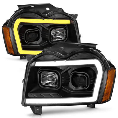 ANZO 2005-2007 Jeep Grand Cherokee Projector Headlights w/ Light Bar Switchback Black Housing 111543